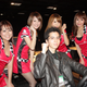 Illustration for article titled Virtual Racing Is Better With A Race Queen Pit Crew